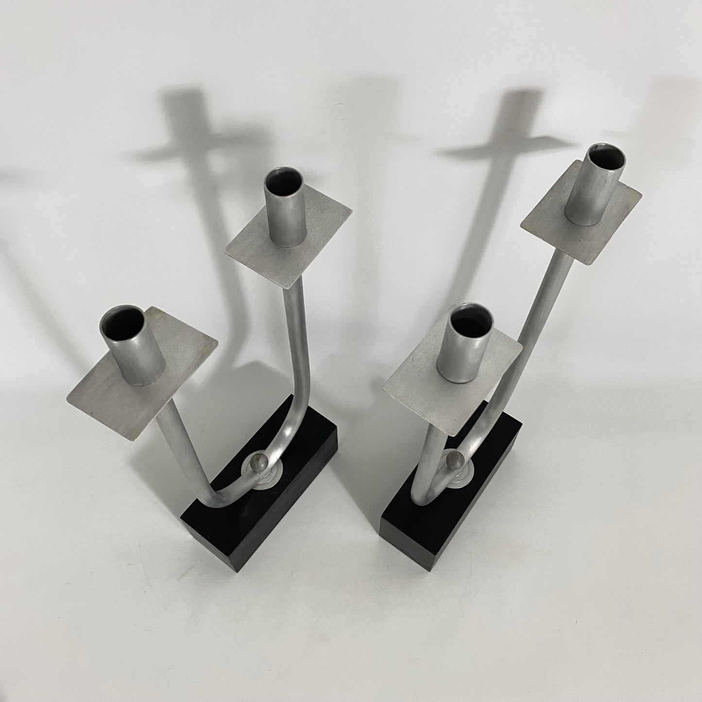 Modernist Steel Candelabra Holder Pair on an Ebonized Wood Bases